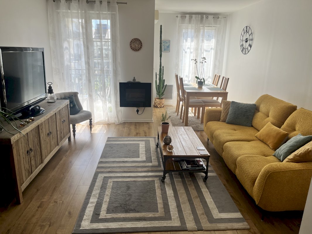 Appartement T3 traversant - Photo 1 - Chessy