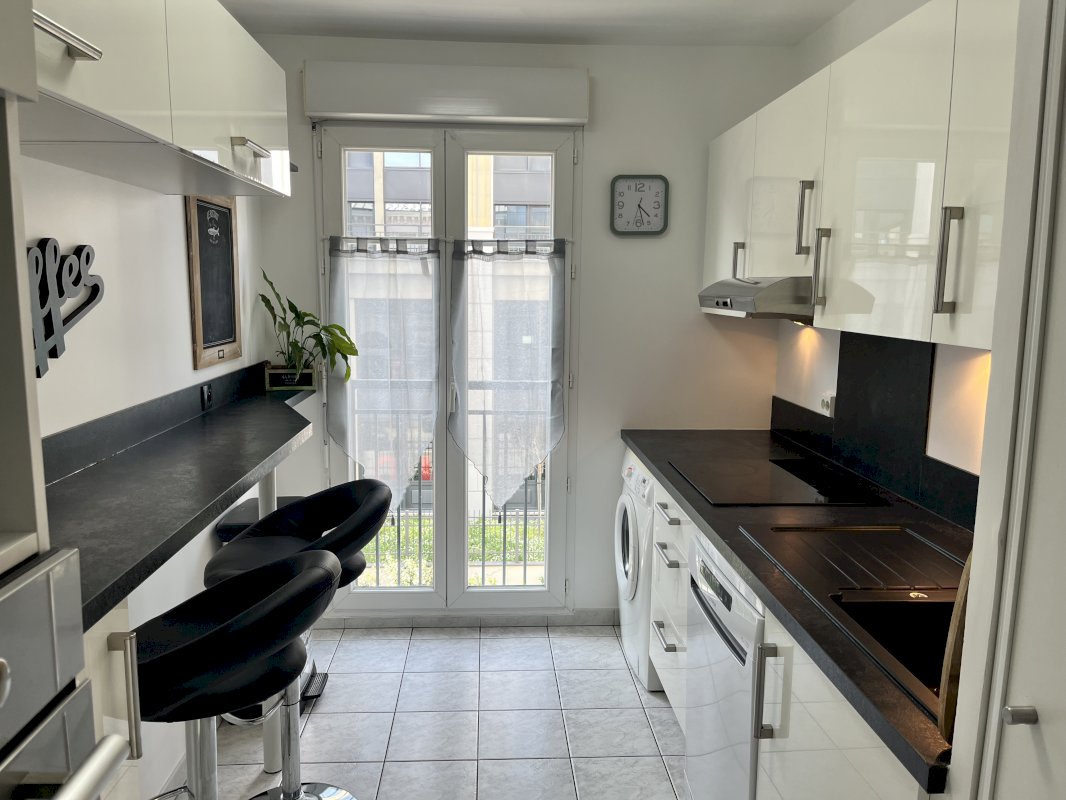 Appartement T3 traversant - Photo 3 - Chessy